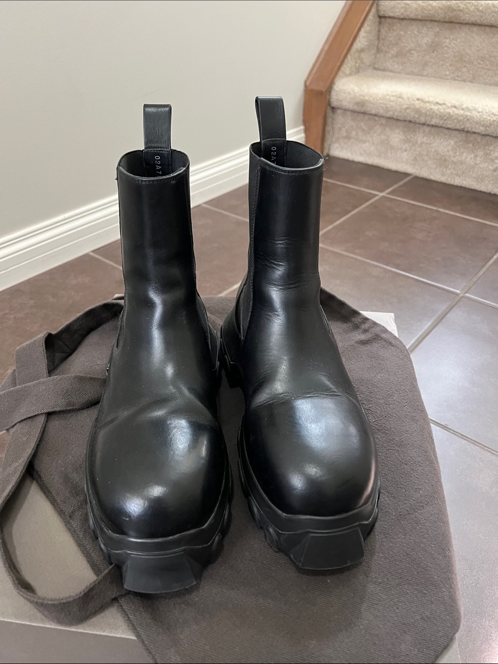 RICK OWENS
Black Beatle Bozo Tractor Boots Women